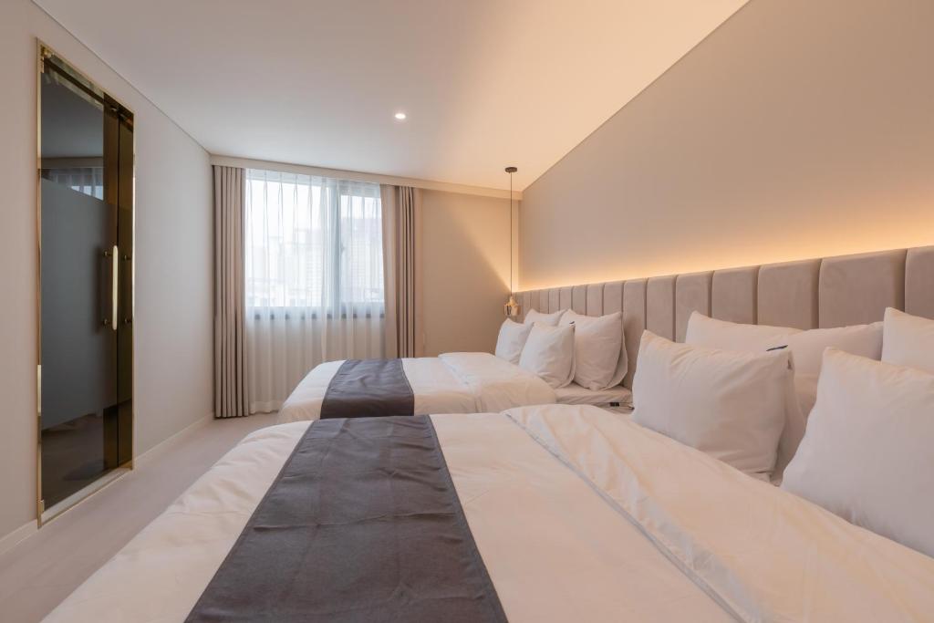 Denbasta Central Hotel Seomyeon - Familienstudio