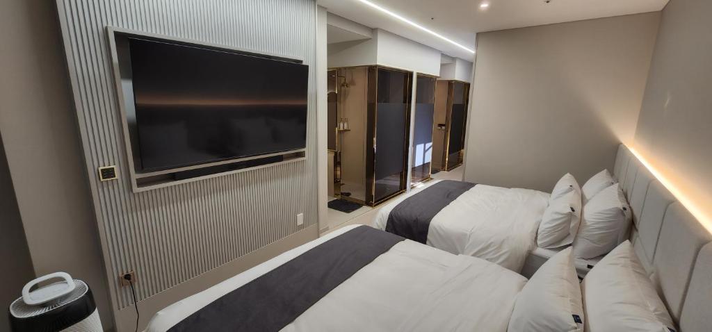 Denbasta Central Hotel Seomyeon - Dreifacher Raum