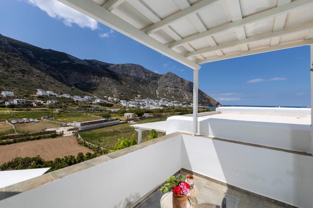 a balcony with a view of the mountains at Villa Areto in Kamares