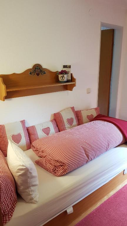 Postel nebo postele na pokoji v ubytování Haus Guentli