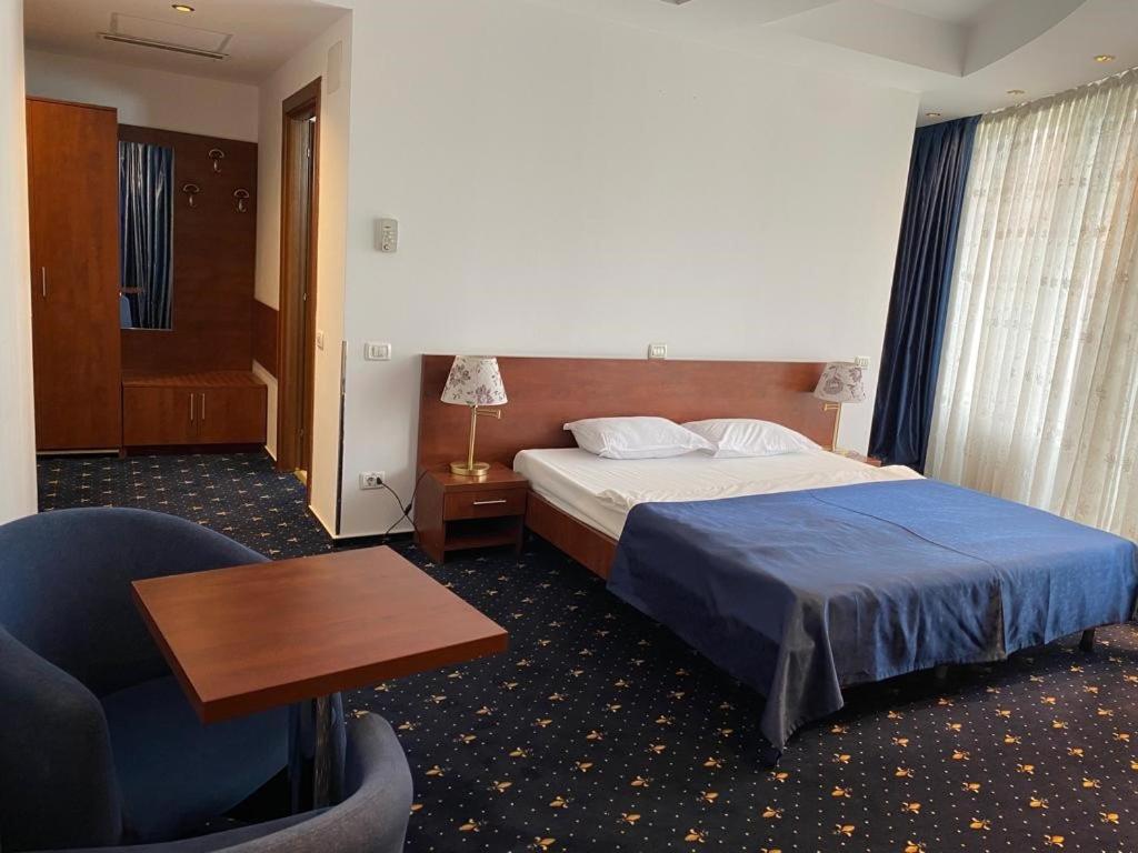 Postel nebo postele na pokoji v ubytování Samaa Hotel