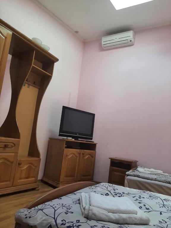 Postel nebo postele na pokoji v ubytování Hotel Nikolet