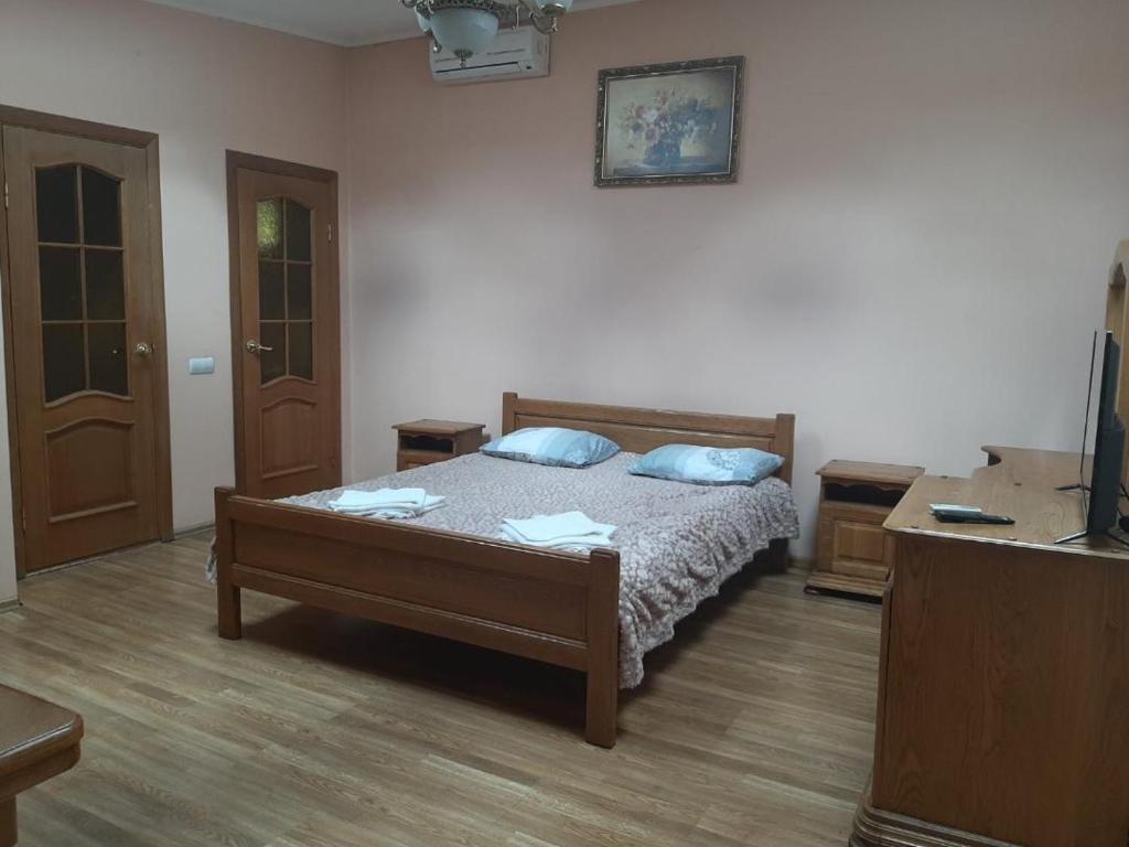 Postel nebo postele na pokoji v ubytování Hotel Nikolet