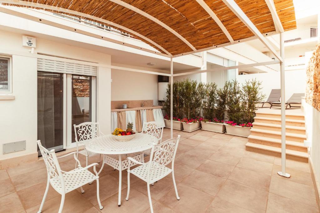 Balkón alebo terasa v ubytovaní Da Riva Suite & Pool - Housea