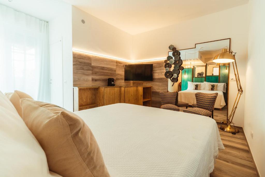 Posteľ alebo postele v izbe v ubytovaní Da Riva Suite & Pool - Housea