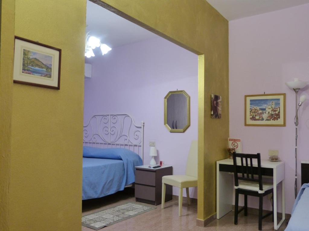 Posteľ alebo postele v izbe v ubytovaní Elisir b&b