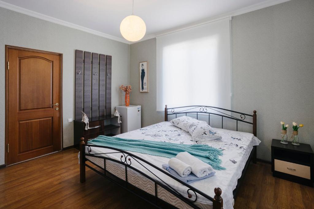 Postel nebo postele na pokoji v ubytování Marcos Hotel