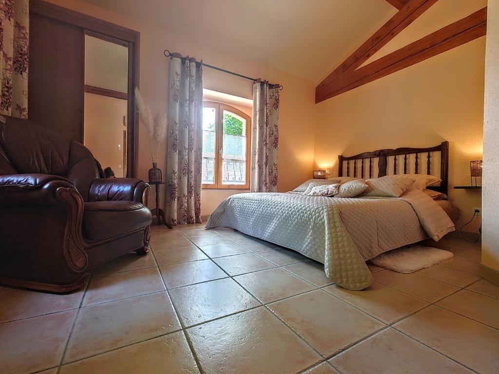 Postel nebo postele na pokoji v ubytování Relais de Laval
