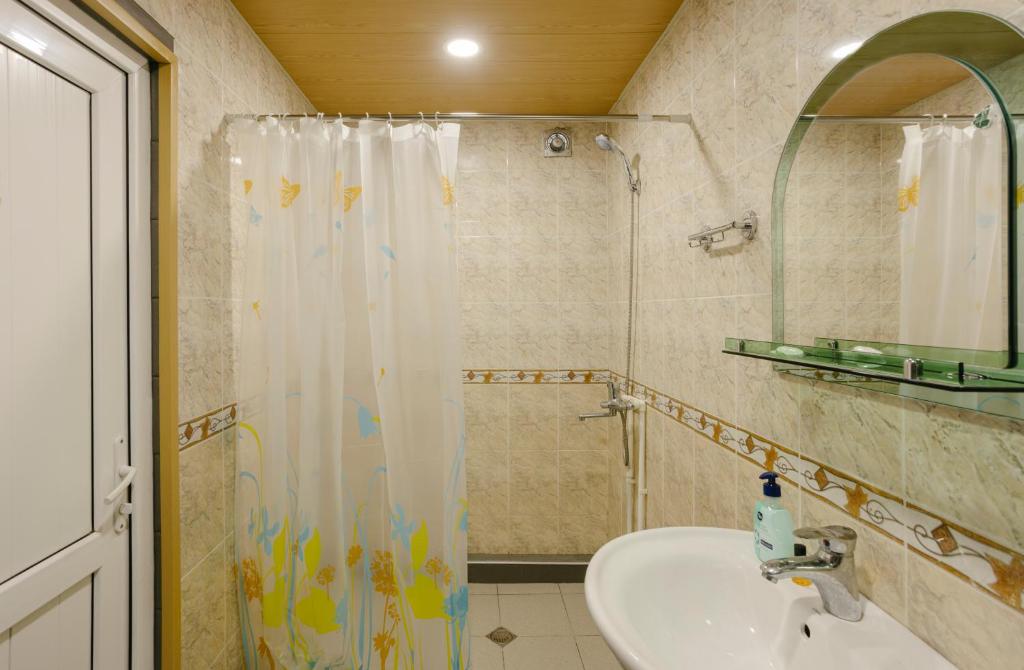 Koupelna v ubytování Marcos Hotel