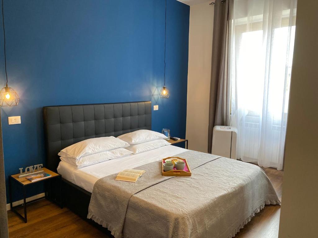 Ένα ή περισσότερα κρεβάτια σε δωμάτιο στο La casa di Alan