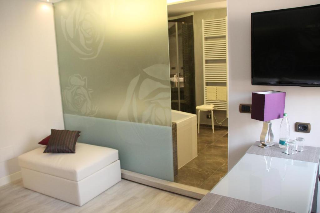 TV a/nebo společenská místnost v ubytování Hotel Soperga