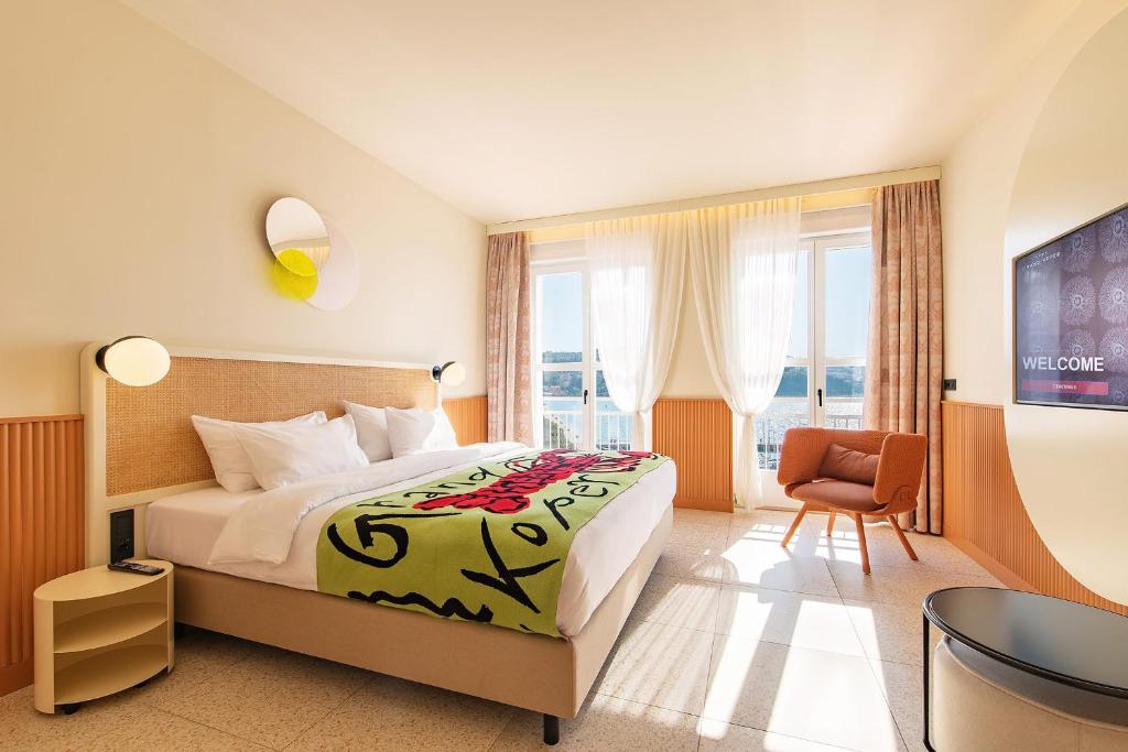 Postelja oz. postelje v sobi nastanitve Hotel Grand Koper