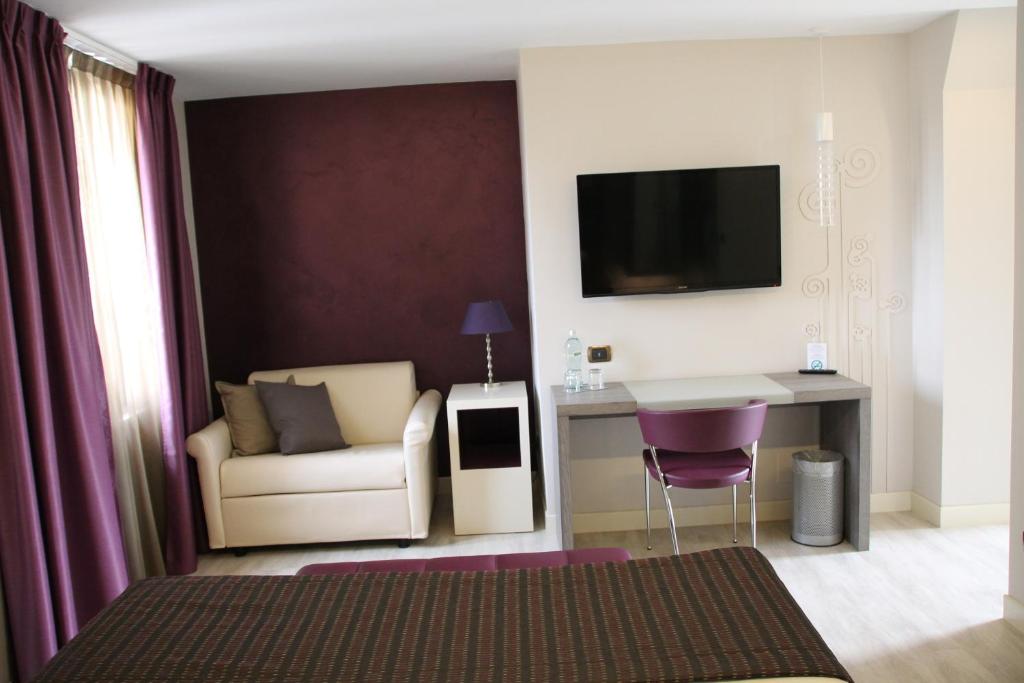 TV a/nebo společenská místnost v ubytování Hotel Soperga