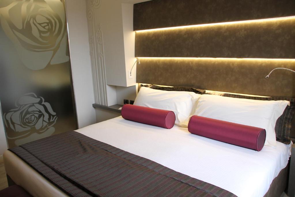 Postel nebo postele na pokoji v ubytování Hotel Soperga