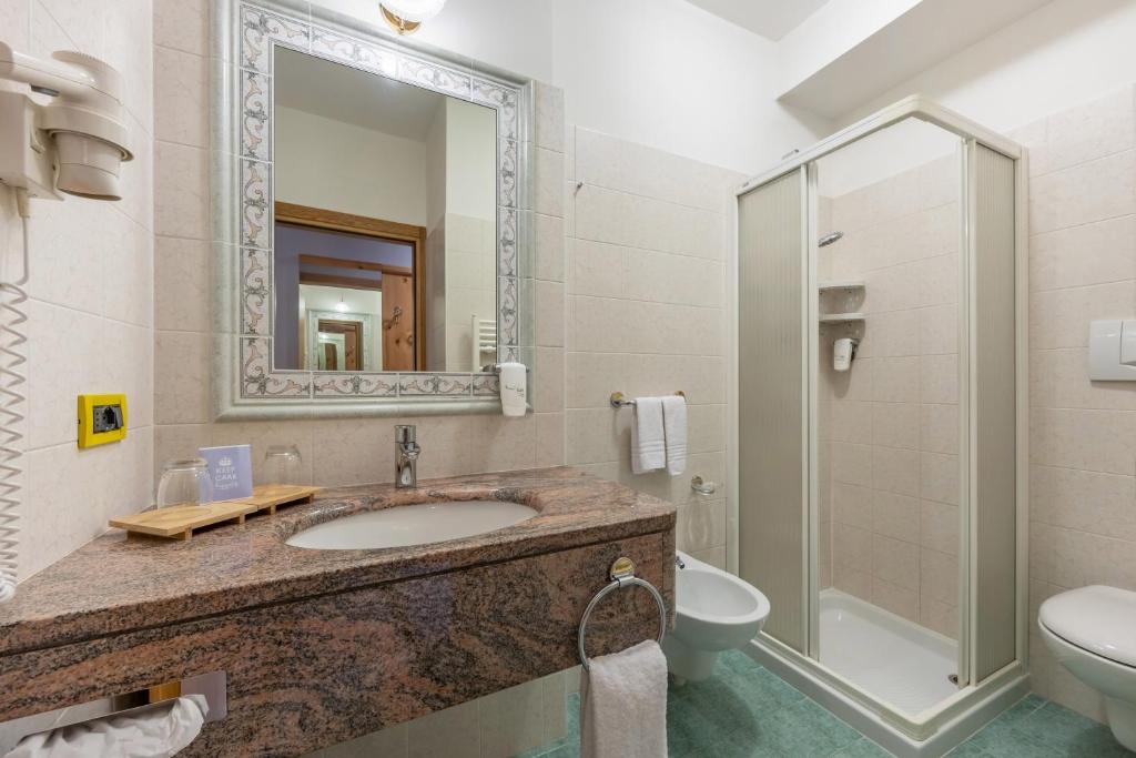 Koupelna v ubytování Hotel Vittoria - Ricarica l'anima