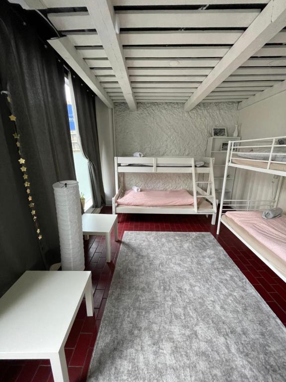 Postel nebo postele na pokoji v ubytování Wherever Mini Hostel
