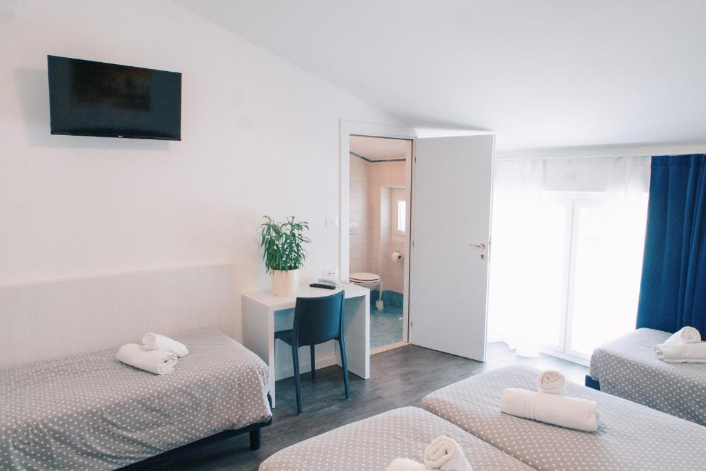 Hotel Aurora & Appartamenti - Habitación Cuádruple