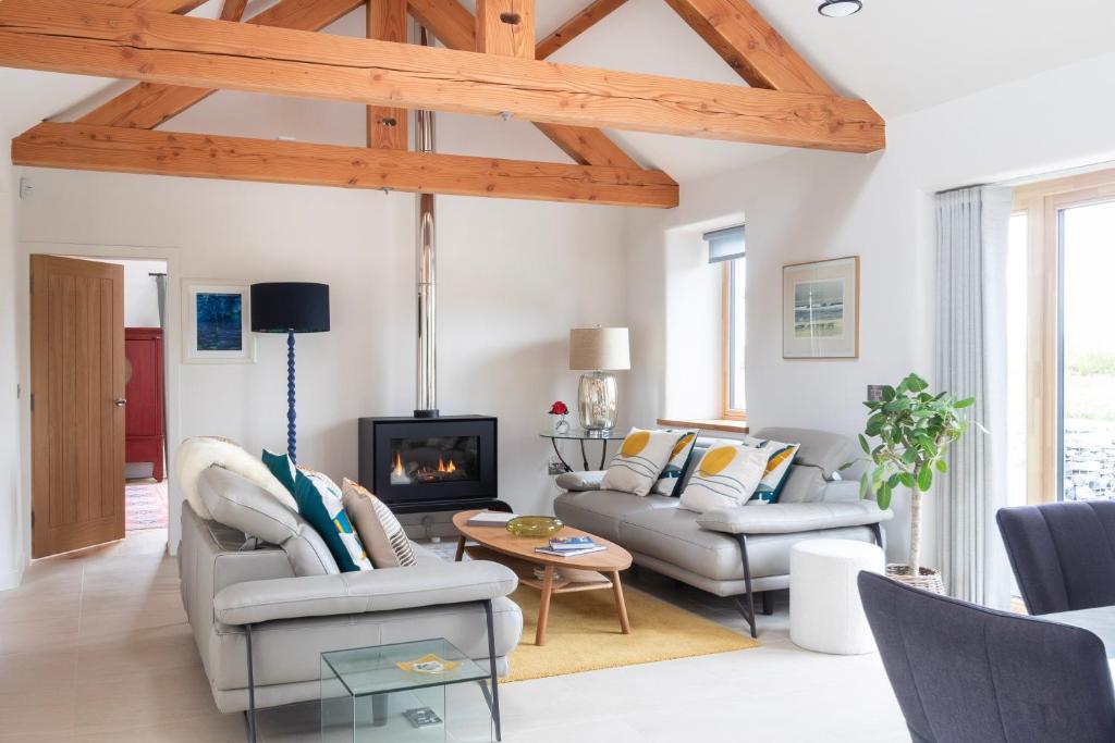 A seating area at The Stables - Luxury Cottage