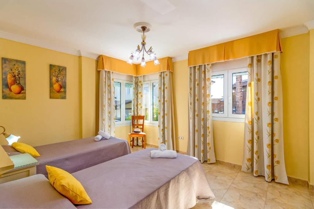 Posteľ alebo postele v izbe v ubytovaní Villa Trebol by Villa Plus