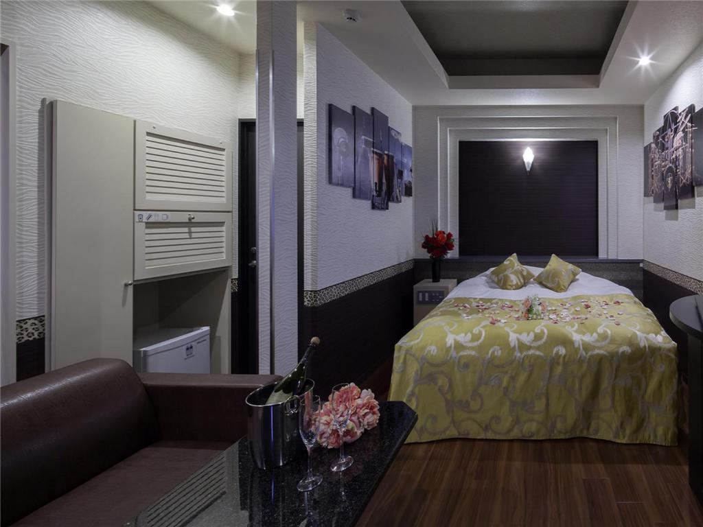 Postel nebo postele na pokoji v ubytování HOTEL xcell