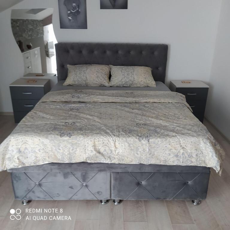 Postel nebo postele na pokoji v ubytování Studio Apartman Dunja