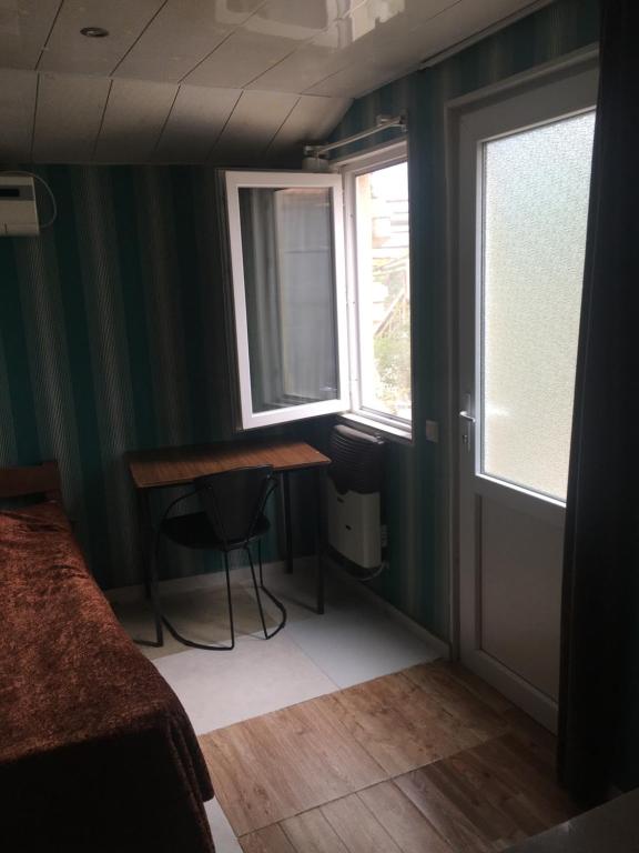 Postel nebo postele na pokoji v ubytování Apartment Zaziashvili 30