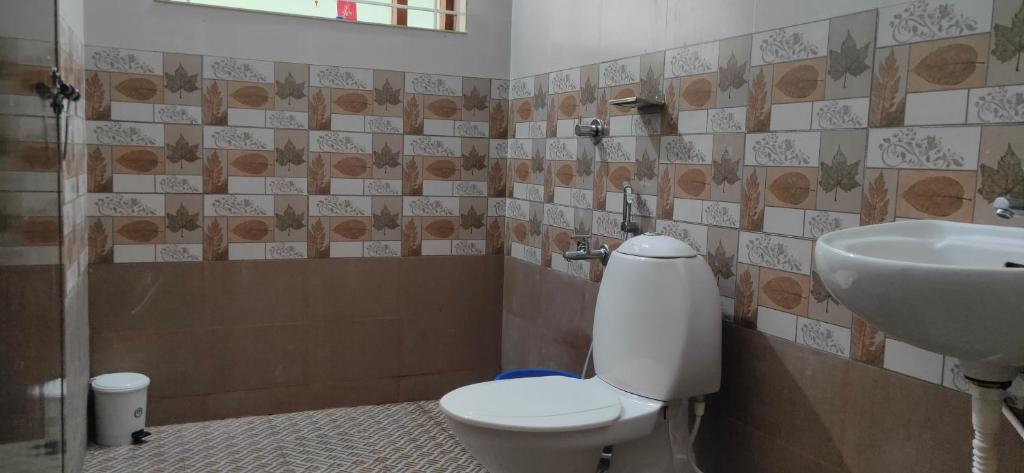 Koupelna v ubytování RAIN DROPS PREMIUM VILLAS - Athirappilly