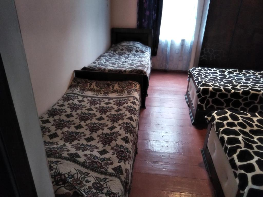 Postel nebo postele na pokoji v ubytování chelo