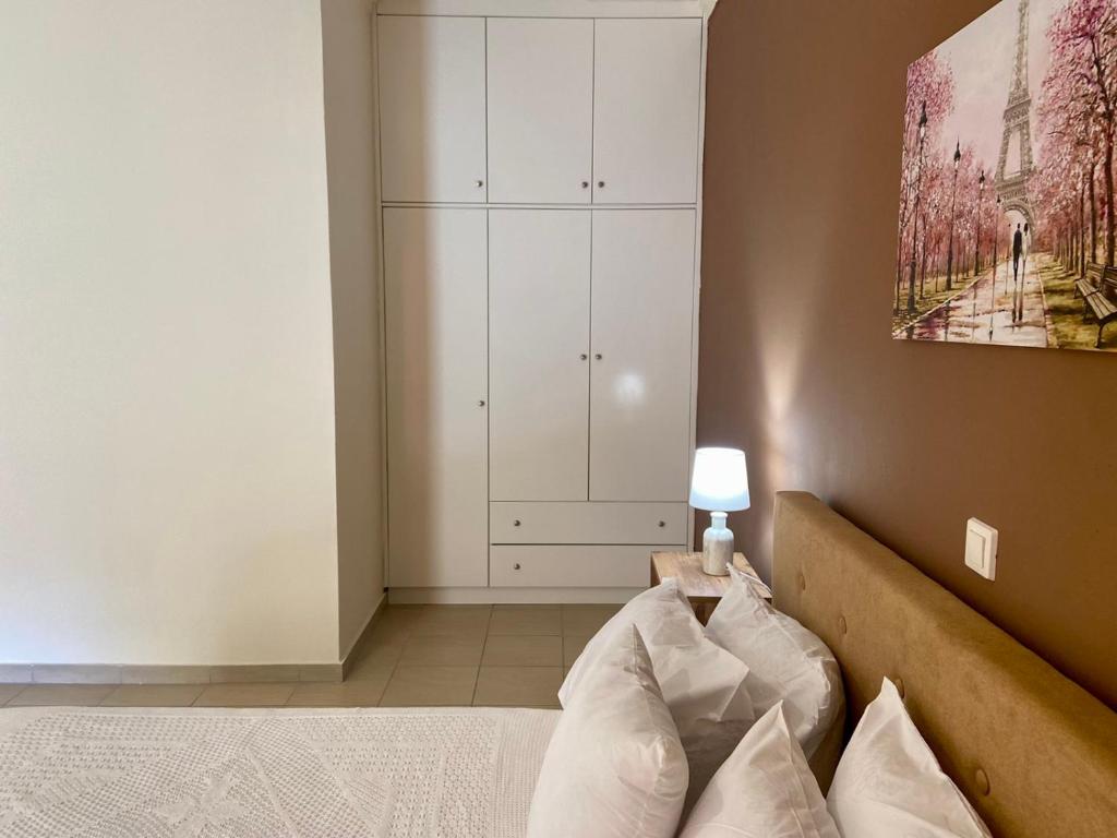 Postel nebo postele na pokoji v ubytování Sweet Home Vassia