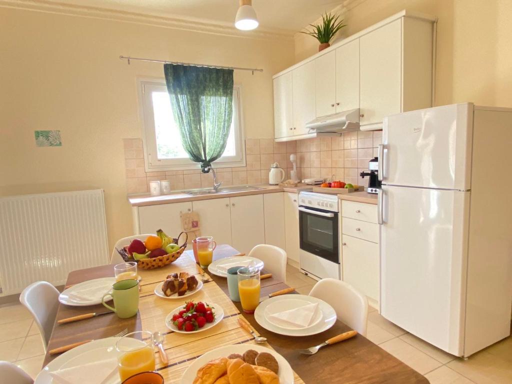 Kuchyň nebo kuchyňský kout v ubytování Sweet Home Vassia