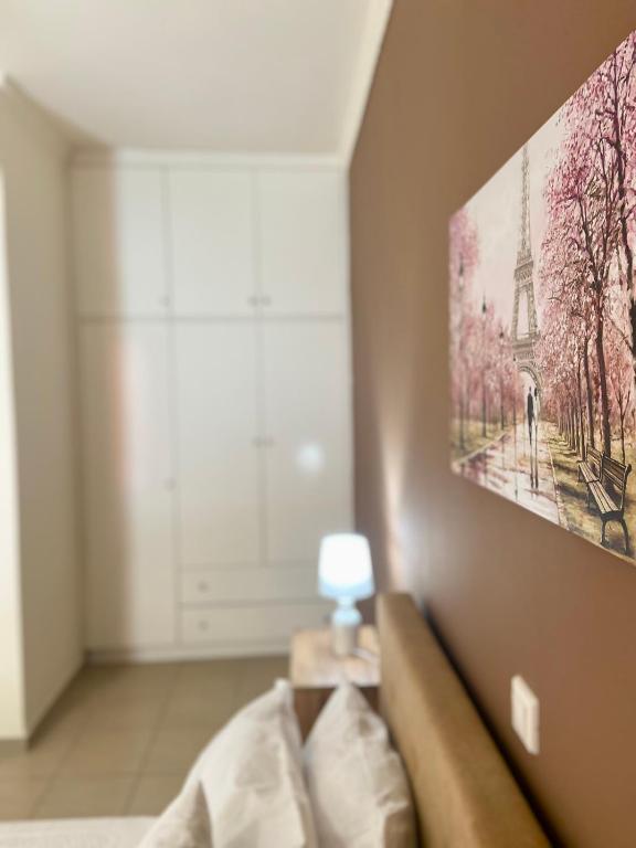 Postel nebo postele na pokoji v ubytování Sweet Home Vassia