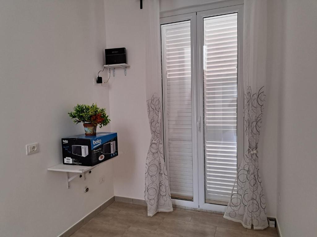 TV a/nebo společenská místnost v ubytování Da Orazio