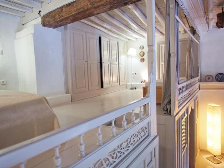Łóżko lub łóżka w pokoju w obiekcie Cycladic House in Skiros