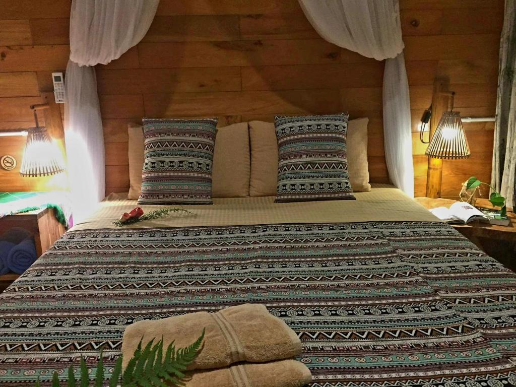 Postel nebo postele na pokoji v ubytování D&D Eco Sapa