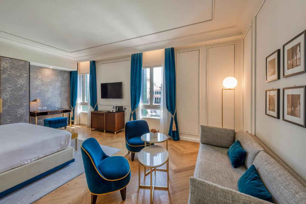 Postel nebo postele na pokoji v ubytování H10 Palazzo Canova