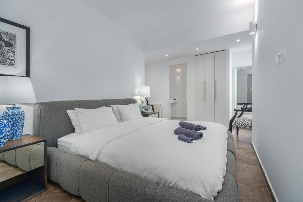 Posteľ alebo postele v izbe v ubytovaní Mare Gaia Apartments