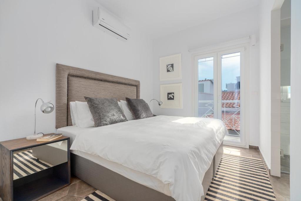 Posteľ alebo postele v izbe v ubytovaní Mare Gaia Apartments
