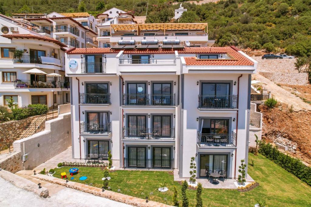 an aerial view of a white apartment building at Lobelya Suites in Kas