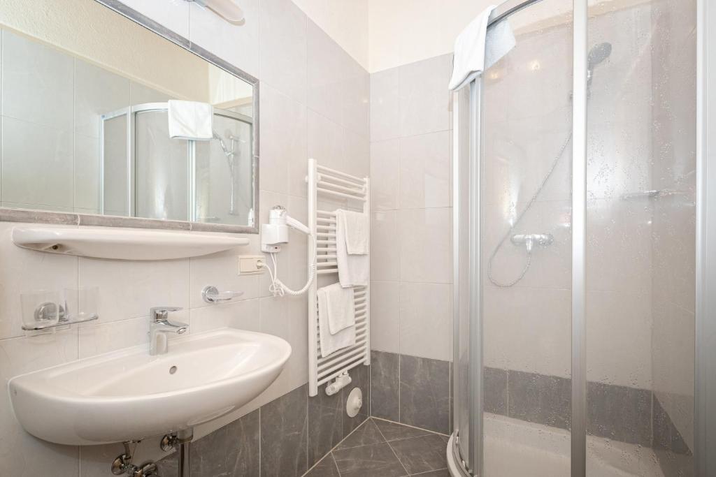 Kúpeľňa v ubytovaní Appartements Olympia