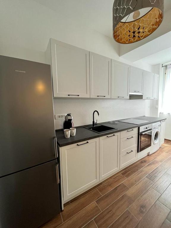 Kuchnia lub aneks kuchenny w obiekcie Lux Apartmans