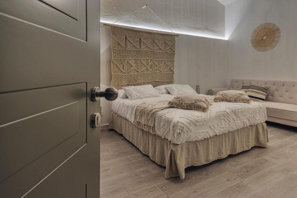 Łóżko lub łóżka w pokoju w obiekcie Dimore D'Avalos Boutique bed & breakfast