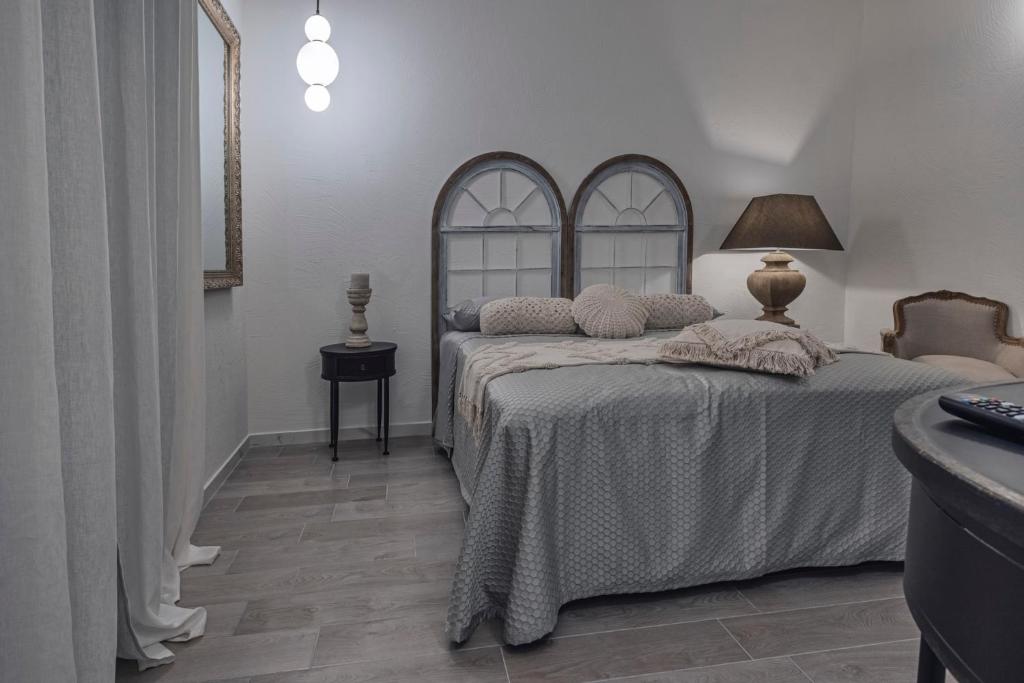Łóżko lub łóżka w pokoju w obiekcie Dimore D'Avalos Boutique bed & breakfast