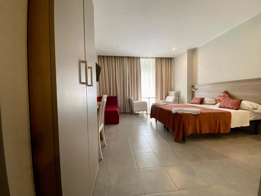 Postel nebo postele na pokoji v ubytování Hotel Vintage Milano Centrale