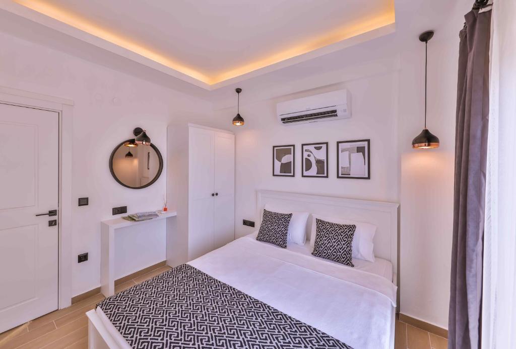 Postel nebo postele na pokoji v ubytování Lobelya Suites