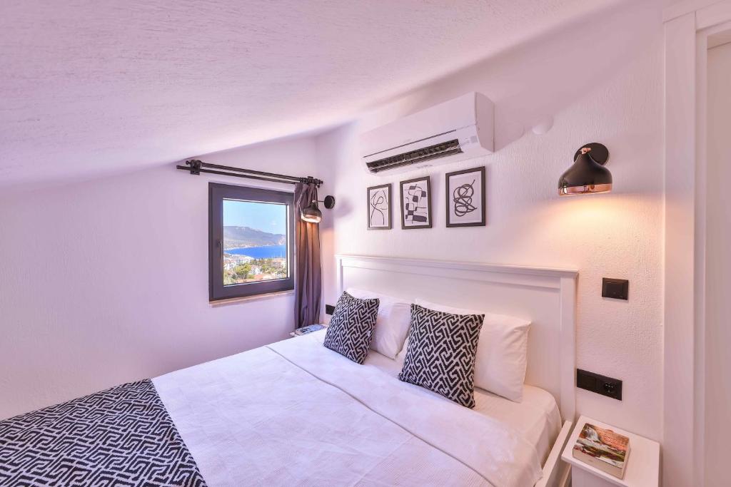 Postel nebo postele na pokoji v ubytování Lobelya Suites