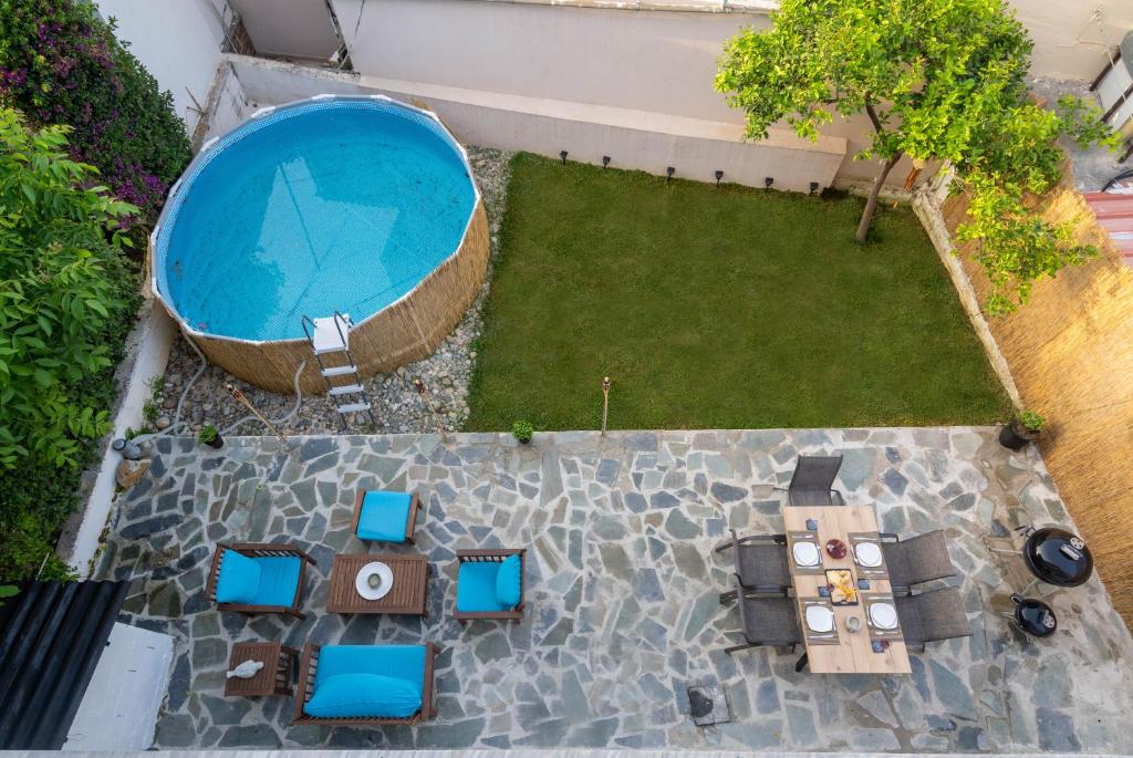 an overhead view of a backyard with a swimming pool at Eden’s garden in Chania Town