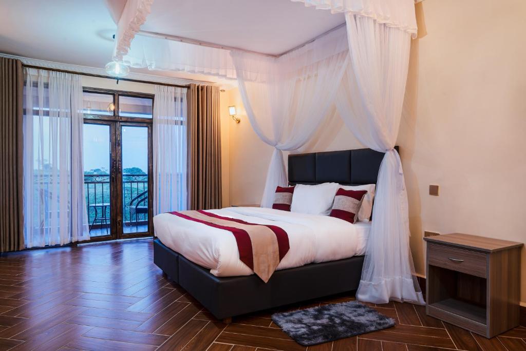 Postel nebo postele na pokoji v ubytování Olsupat Lodge