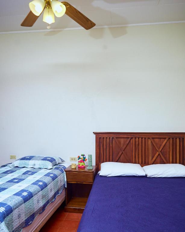 Postel nebo postele na pokoji v ubytování La Posada Copan