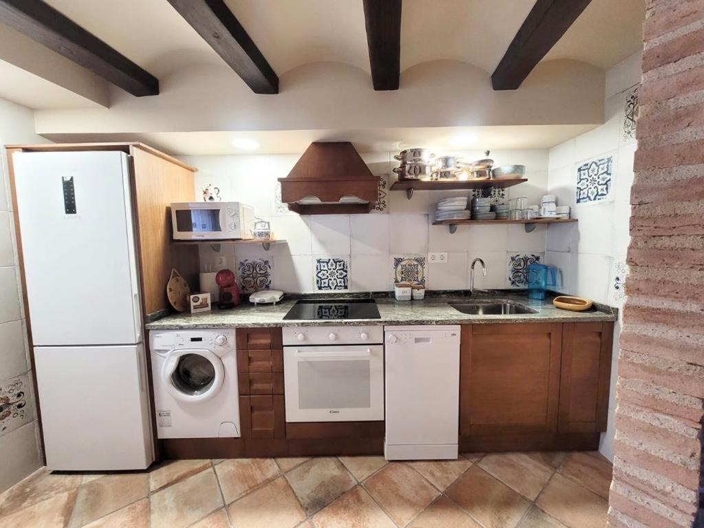 Kuchyň nebo kuchyňský kout v ubytování CASA RURAL SANTA AGUEDA