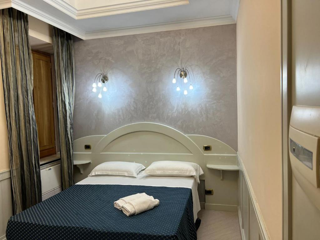 Un ou plusieurs lits dans un hébergement de l'établissement Casa di Stefano